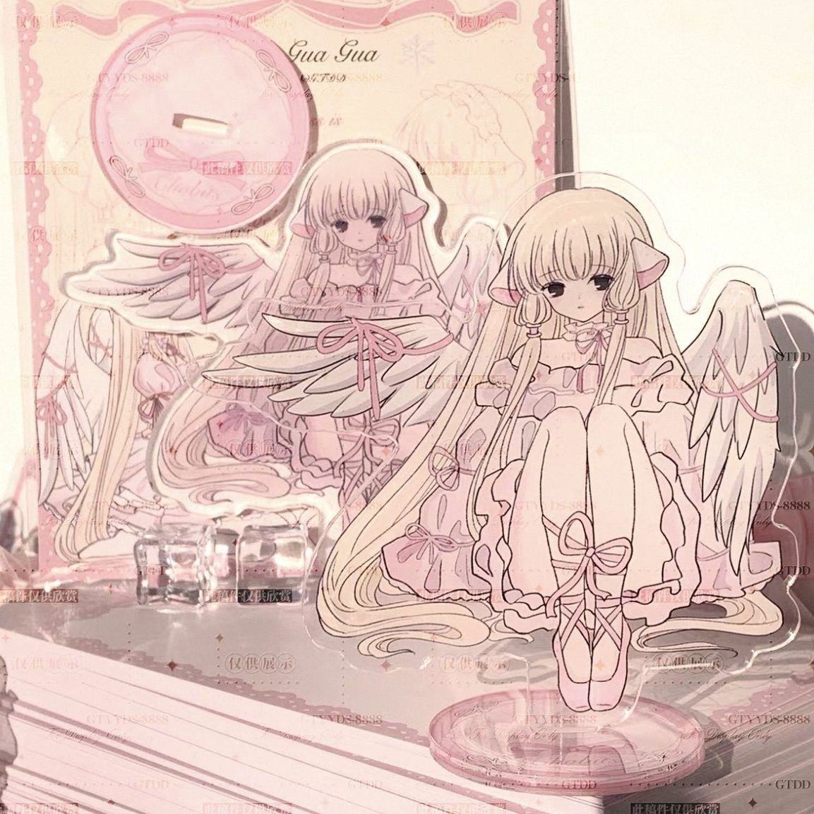 Chobits Chii angel acrylic stand figure – sitting angel pose with wings, side view