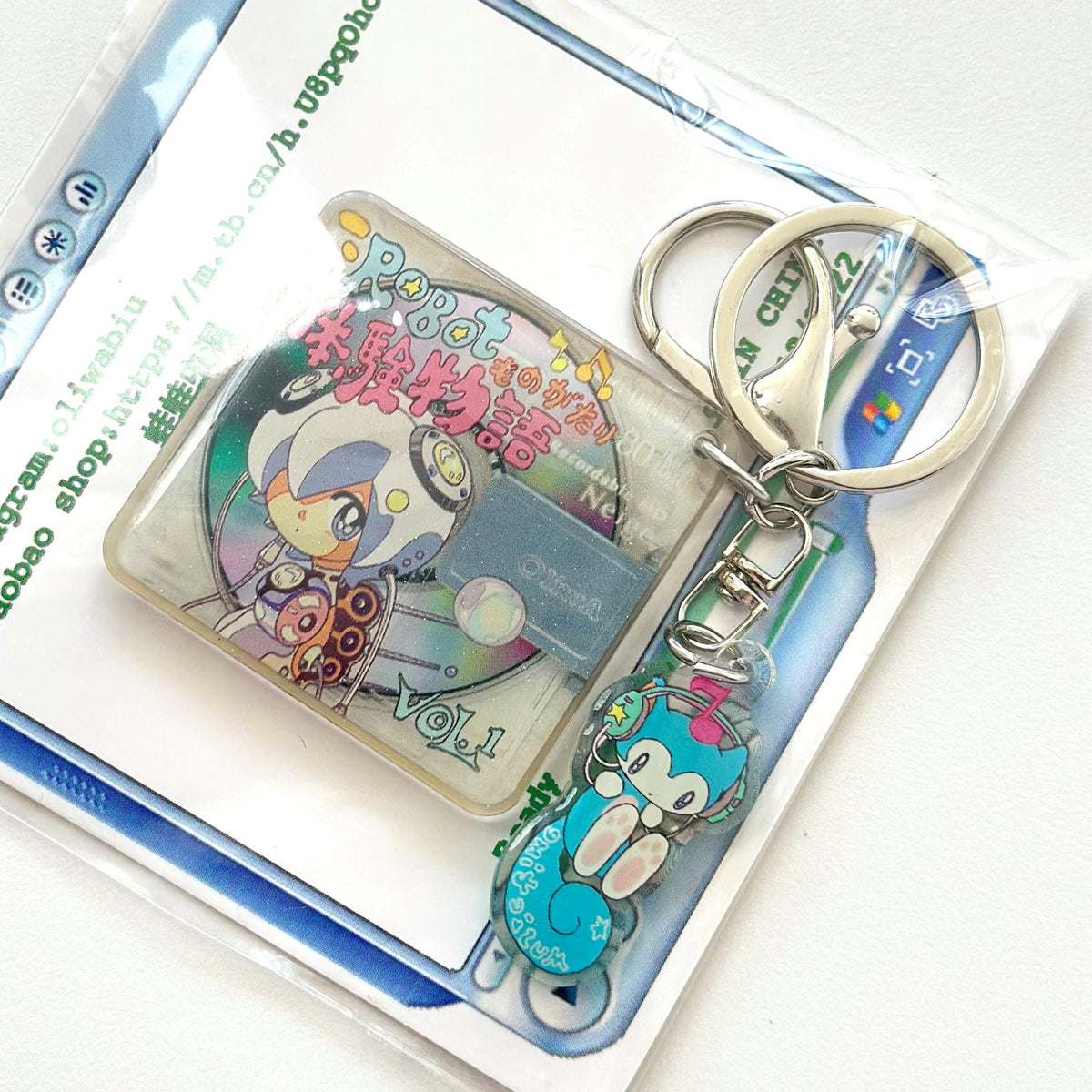 Oliwa PBot Monkey Story retro game console holographic acrylic keychain with blue monkey charm