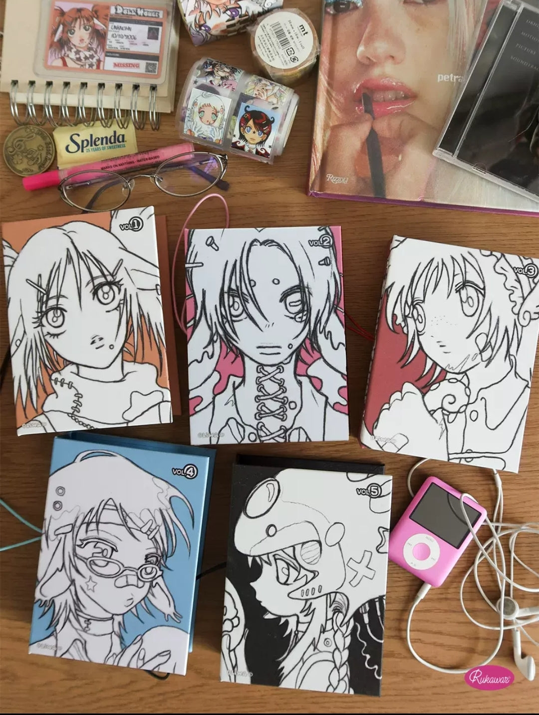 Rukawazx Doll House A7 binder - Vol.1 to Vol.5 covers flat lay