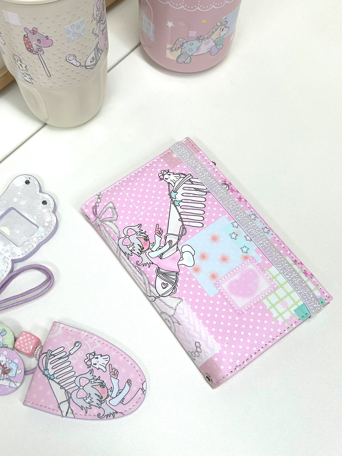 Shishih Shop x Sunonebird passport holder closed view with accessories