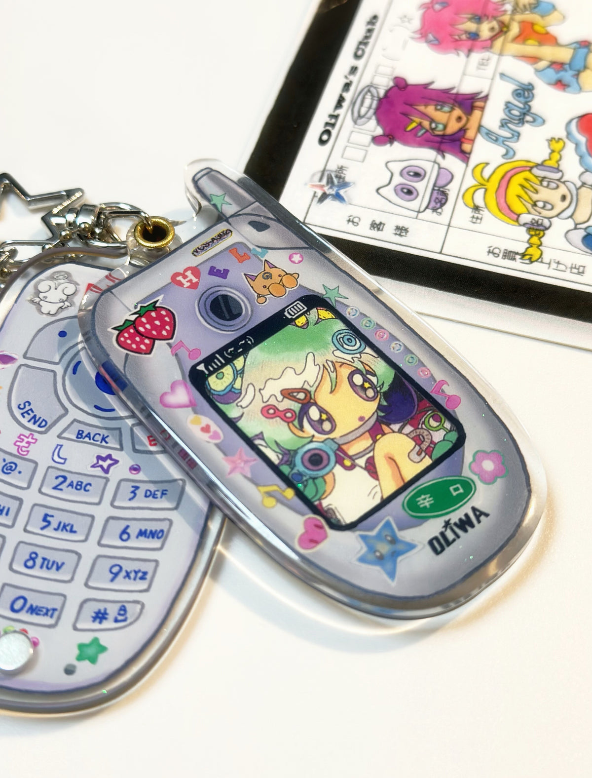 Oliwa mini mobile phone acrylic glitter keychain - front and back view with sticker sheet