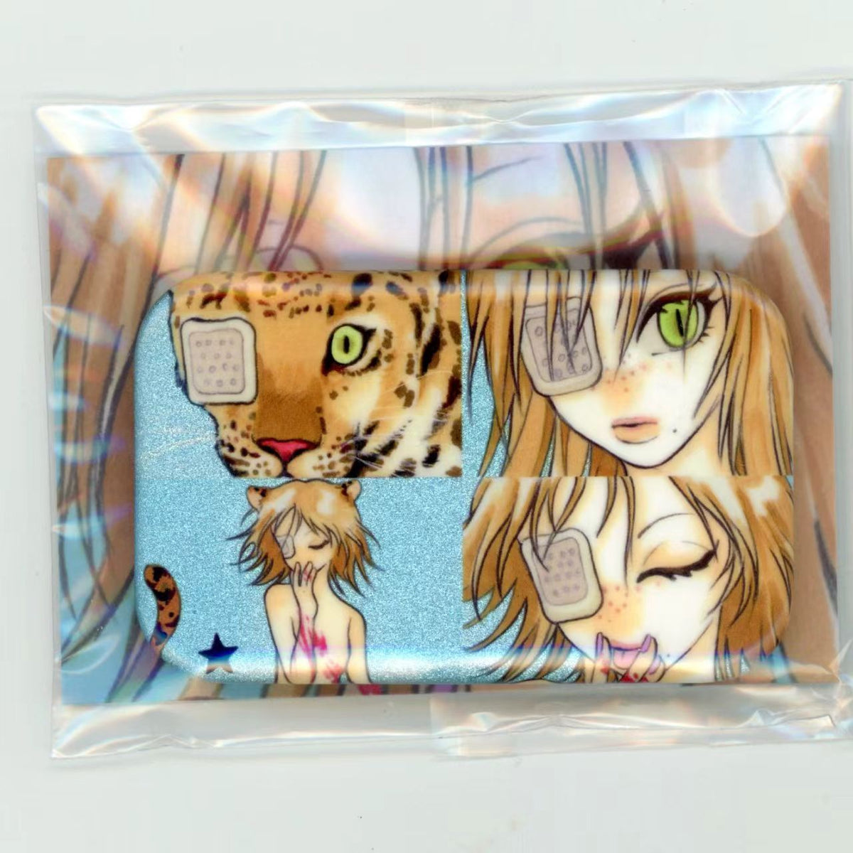 Oliwa 7x4.3cm manga badge - leopard girl with cat eyes illustration