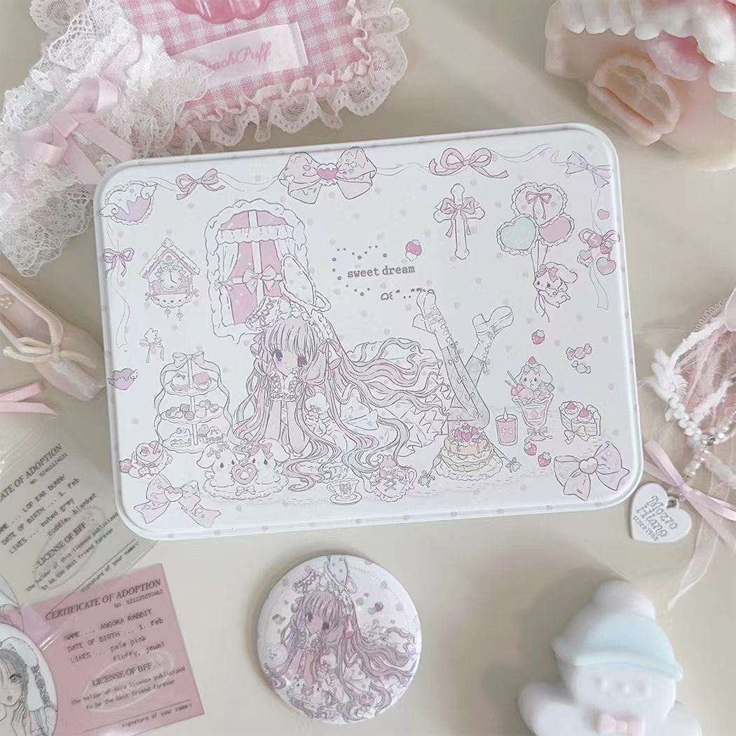 Chobits Sweet Dream tin storage box – top view showing full Chii illustration with sweet dream text and button badge