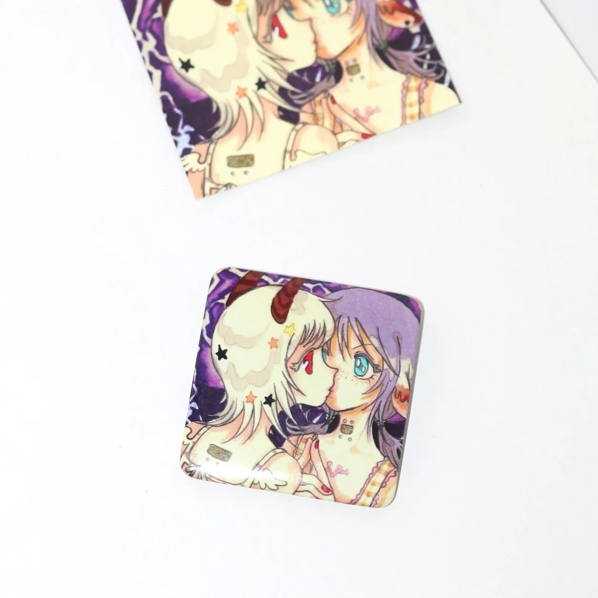 Oliwa Angel's Lullaby purple duo square acrylic badge with illustrated backing card