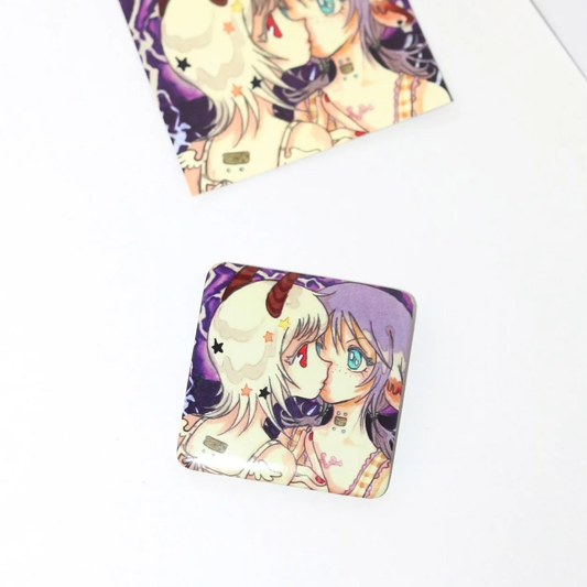 Oliwa Angel's Lullaby purple duo square acrylic badge with illustrated backing card