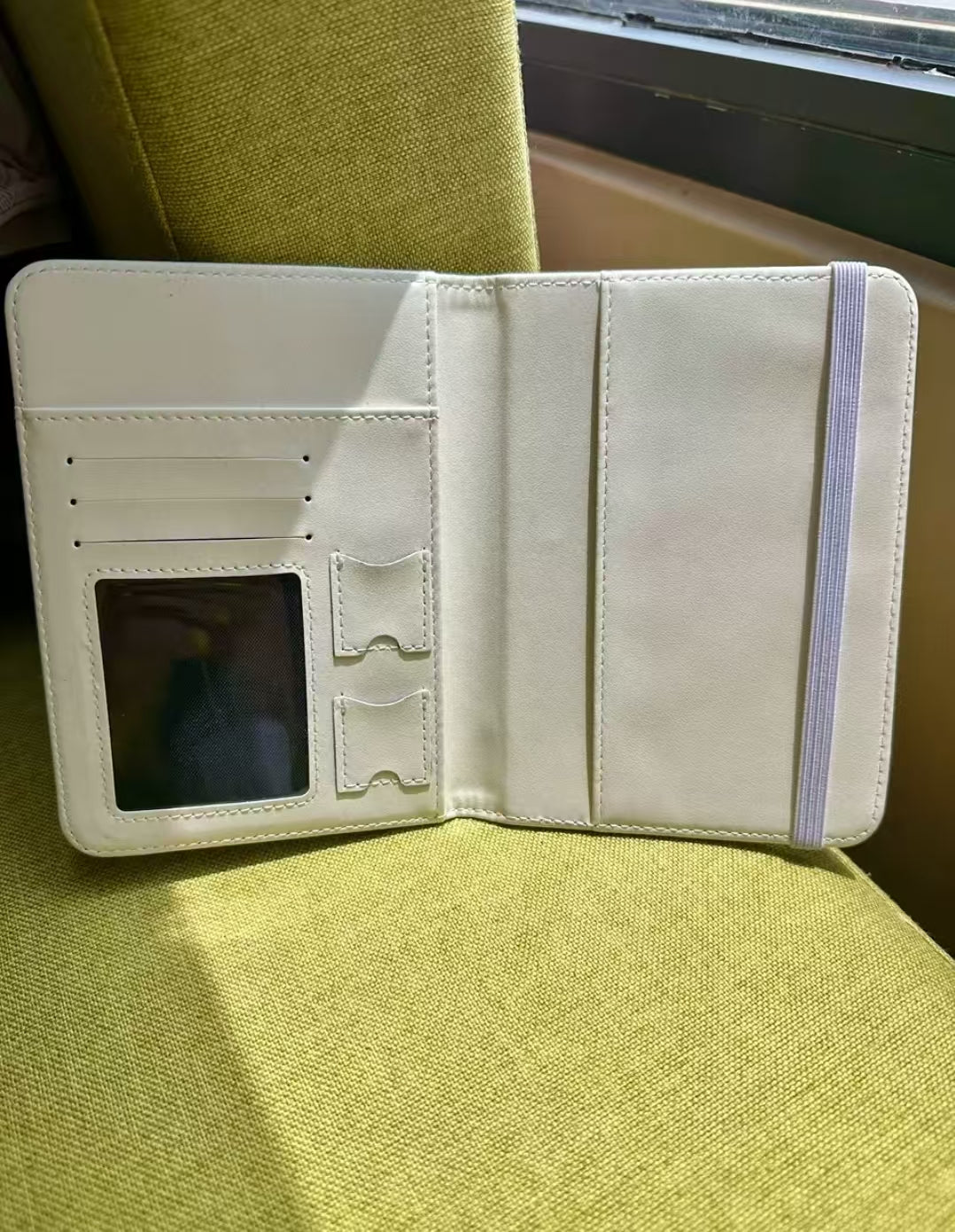 ACCIO x Oliwa Dear Friend passport holder - open interior showing elastic passport pocket